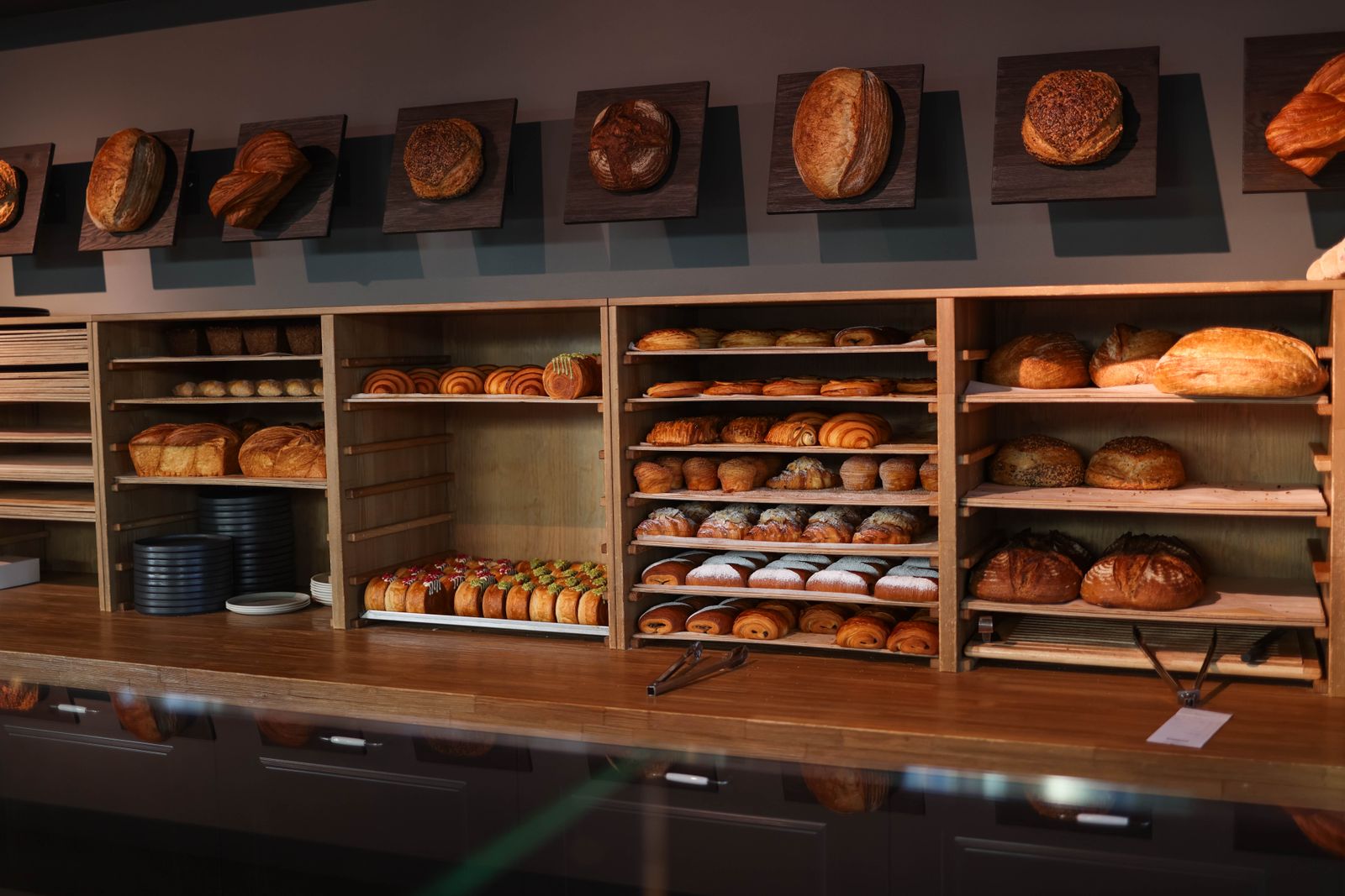 Bread and pastries on display in a small bakery