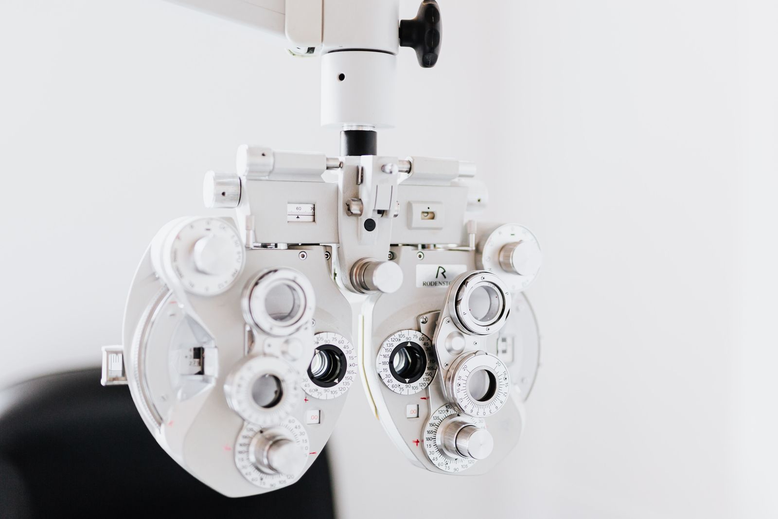 A phoropter in a bright test room