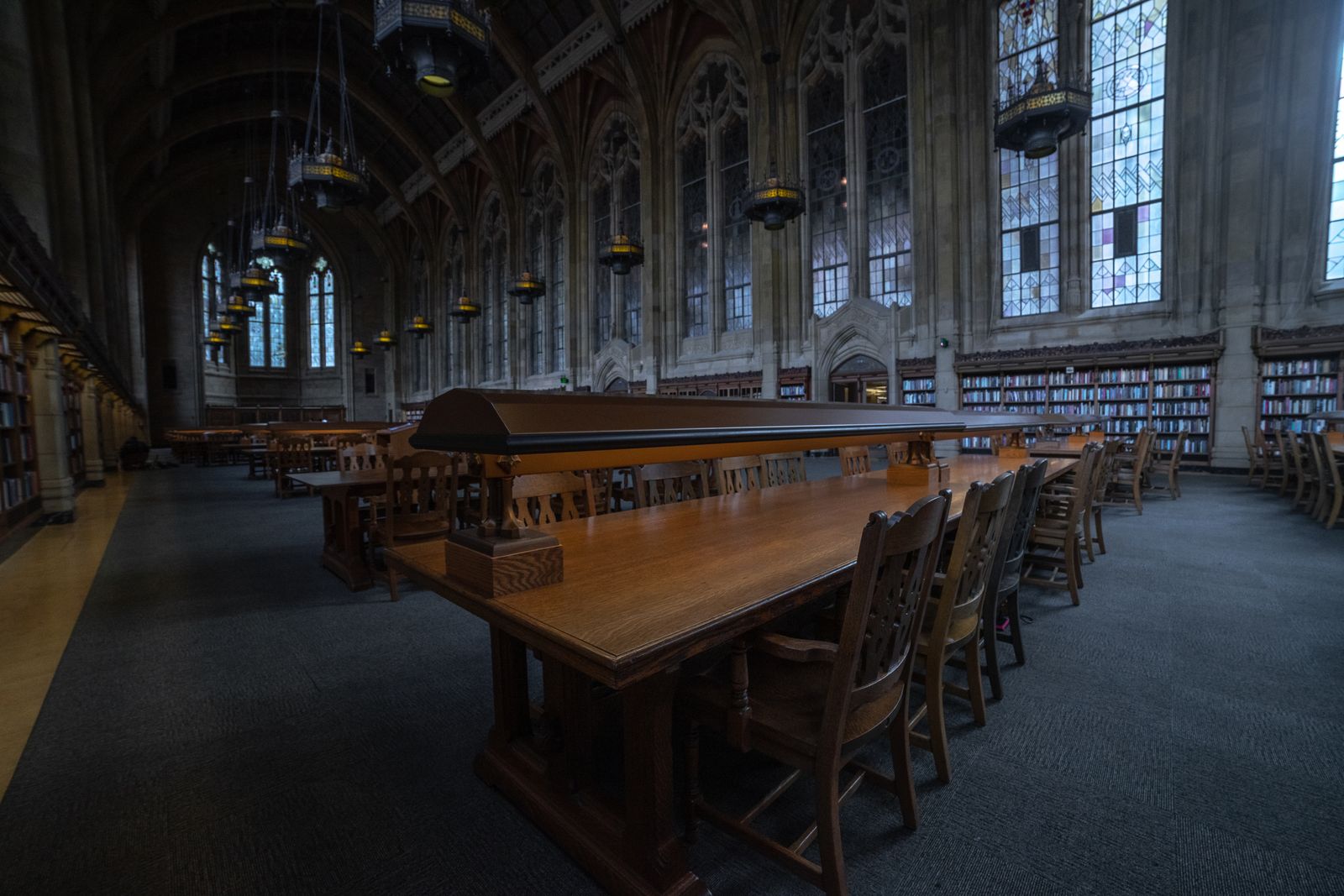 Long reading tables in a historic library hall